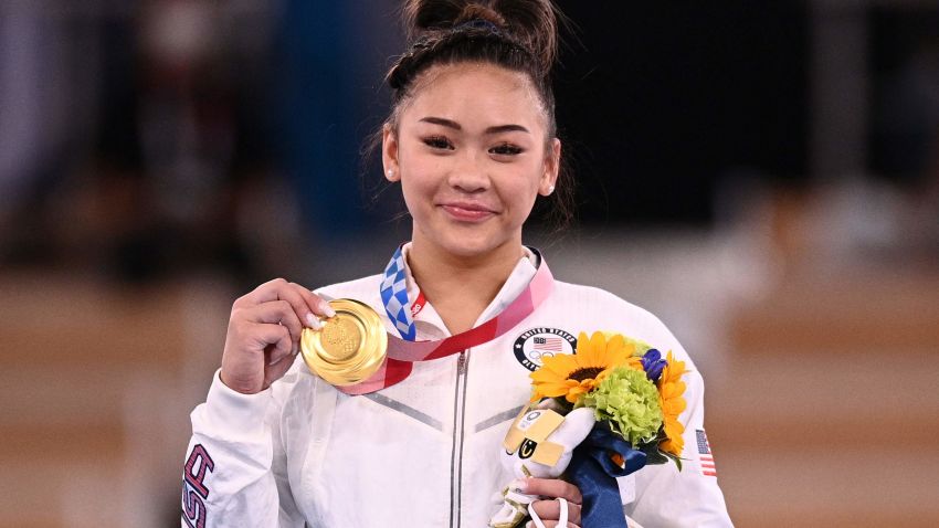 USA's Sunisa Lee poses with her gold medal during the podium ceremony of the artistic gymnastics women's all-around final during the Tokyo 2020 Olympic Games at the Ariake Gymnastics Centre in Tokyo on July 29, 2021. (Photo by Martin BUREAU / AFP) (Photo by MARTIN BUREAU/AFP via Getty Images)