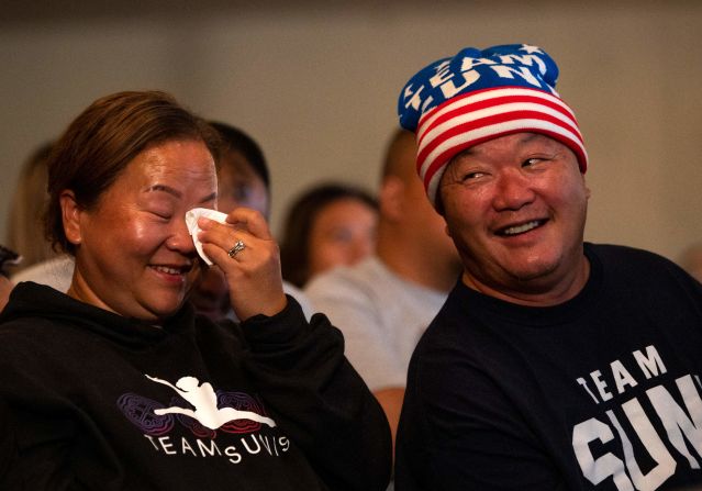 Lee's parents, Yeev Thoj and John Lee, react while watching their daughter from Oakdale, Minnesota. In 2019, John Lee <a href="index.php?page=&url=https%3A%2F%2Fedition.cnn.com%2Fworld%2Flive-news%2Ftokyo-2020-olympics-07-28-21-spt%2Fh_6d5e826fde8fb1a00b3882bd012f5596" target="_blank">suffered an accident</a> that left him paralyzed.