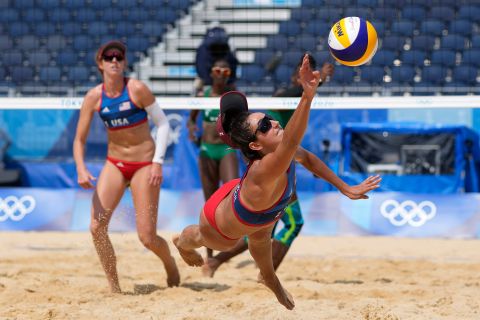 US beach volleyball player Sarah Sponcil stretches out for a ball during a match on July 29.