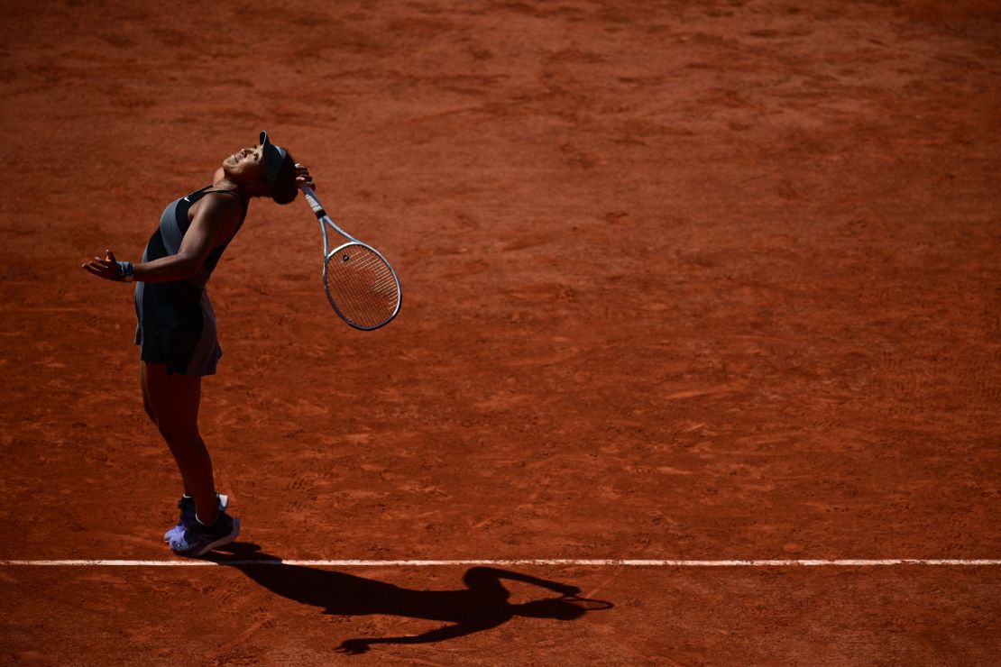 Naomi Osaka serves the ball to Romania's Patricia Maria Tig during their women's singles first round match on Day 1 of the French Open tennis tournament in Paris on May 30, 2021. 