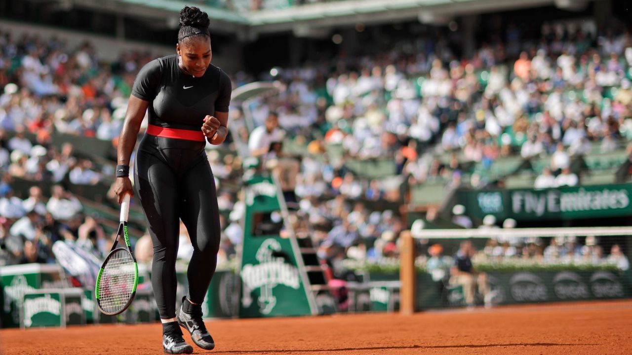 Serena Williams clenches her fist after scoring a point against Krystina Pliskova  during their first round match of the French Open at the Roland Garros stadium in Paris, France, Tuesday, May 29, 2018.