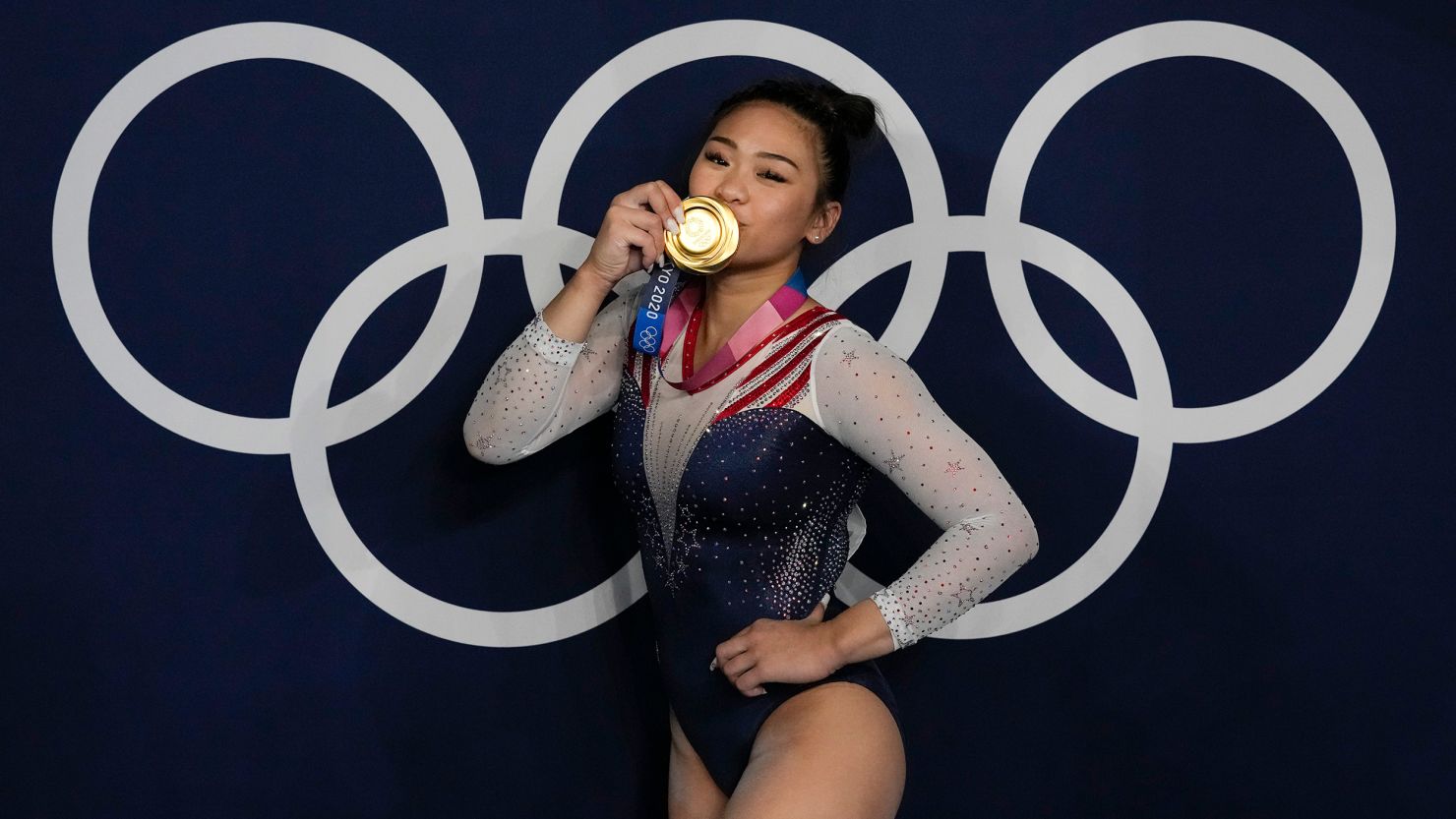 Sunisa Lee, of  the United States, reacts as she poses for a picture after winning the gold medal in the artistic gymnastics women's all-around final at the 2020 Summer Olympics, Thursday, July 29, 2021, in Tokyo, Japan. 