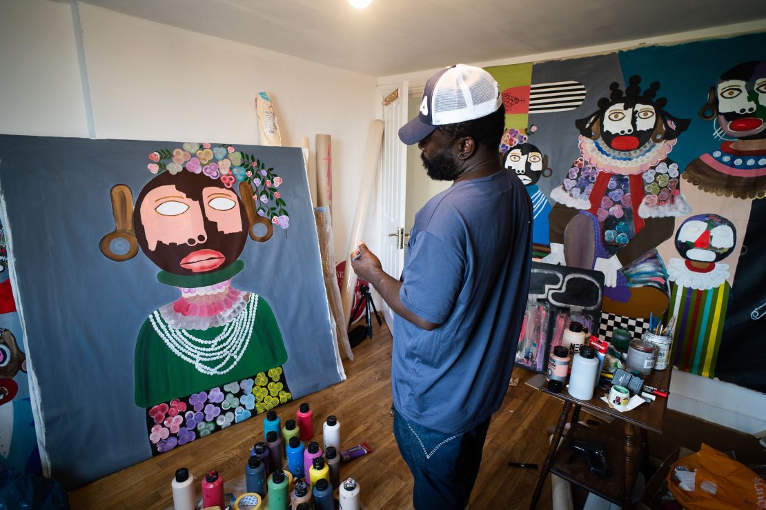 Artist Kojo Marfo working from his home studio in south London.