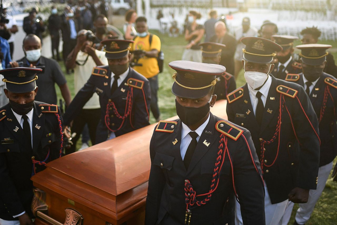 Police carry the coffin of slain Haitian President Jovenel Moise at the start of <a href="https://www.cnn.com/2021/07/23/americas/haiti-moise-kidnappings-refugees-insecurity-intl-cmd/index.html" target="_blank">his funeral</a> in Cap-Haitien, Haiti, on Friday, July 23. Moise was assassinated during an attack on his private residence.
