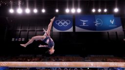 US gymnast Sunisa "Suni" Lee competes on the balance beam during the individual all-around final on Thursday, July 29. Lee won the individual all-around, becoming the fifth straight American to win the event going back to the 2004 Olympics. 