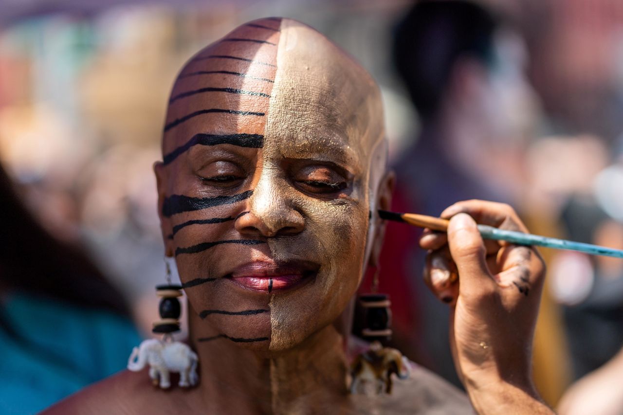 Theresa Snipe is painted at New York's Union Square during the city's annual Bodypainting Day on Sunday, July 25.