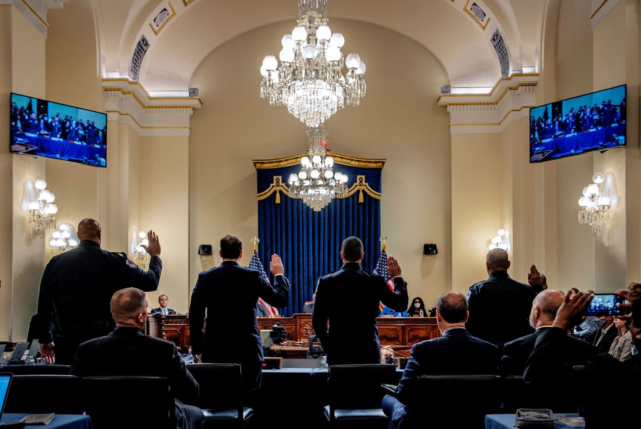 From left, US Capitol Police Sgt. Harry Dunn, Washington Metropolitan Police Officer Daniel Hodges, Washington Metropolitan Police Officer Michael Fanone and US Capitol Police Sgt. Aquilino Gonell are sworn in Tuesday, July 27, before testifying<a href="https://www.cnn.com/2021/07/27/politics/lingering-wounds-capitol-attacks/index.html" target="_blank"> before a House select committee investigating the January 6 attack on the Capitol. </a>