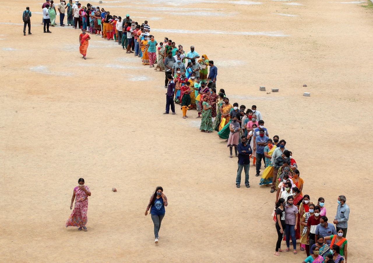 Hundreds of people line up to receive their second dose of the Covid-19 vaccine in Hyderabad, India, on Thursday, July 29.