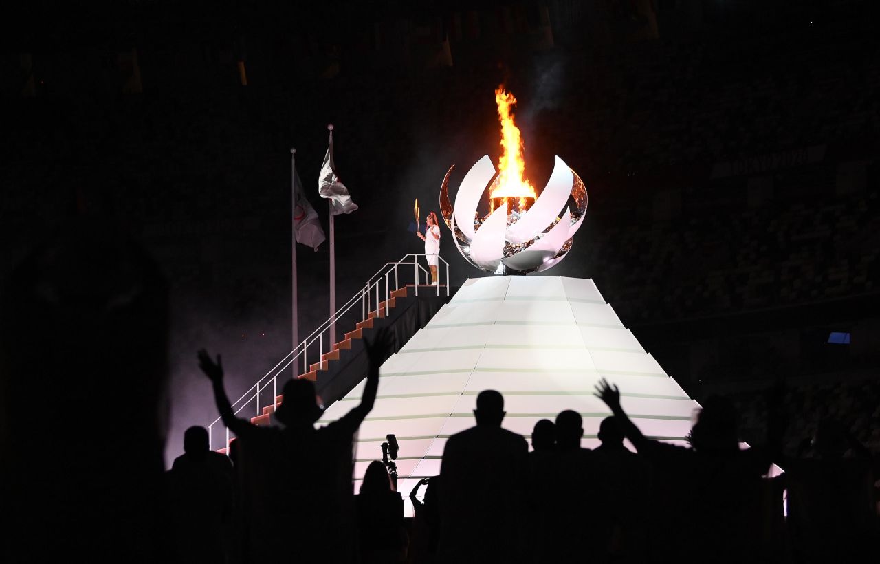 Japanese tennis star Naomi Osaka <a href="https://www.cnn.com/2021/07/23/sport/tokyo-olympics-opening-ceremony-spt-intl/index.html" target="_blank">lights the Olympic cauldron</a> at the end of the opening ceremony on Friday, July 23. <a href="http://www.cnn.com/2021/07/22/world/gallery/photos-this-week-july-15-july-22/index.html" target="_blank">See last week in 32 photos</a>