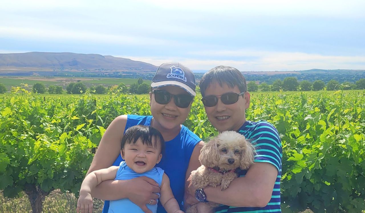 <strong>Family photo: </strong>Mae and Jon now have a son, Joseph. Here they are, along with their dog Heidi, wine tasting at Red Mountain AVA in Eastern Washington in the US.