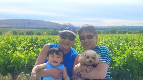 Takagi and Fortuna on a recent wine tasting trip with their son Joseph, and their dog Heidi.