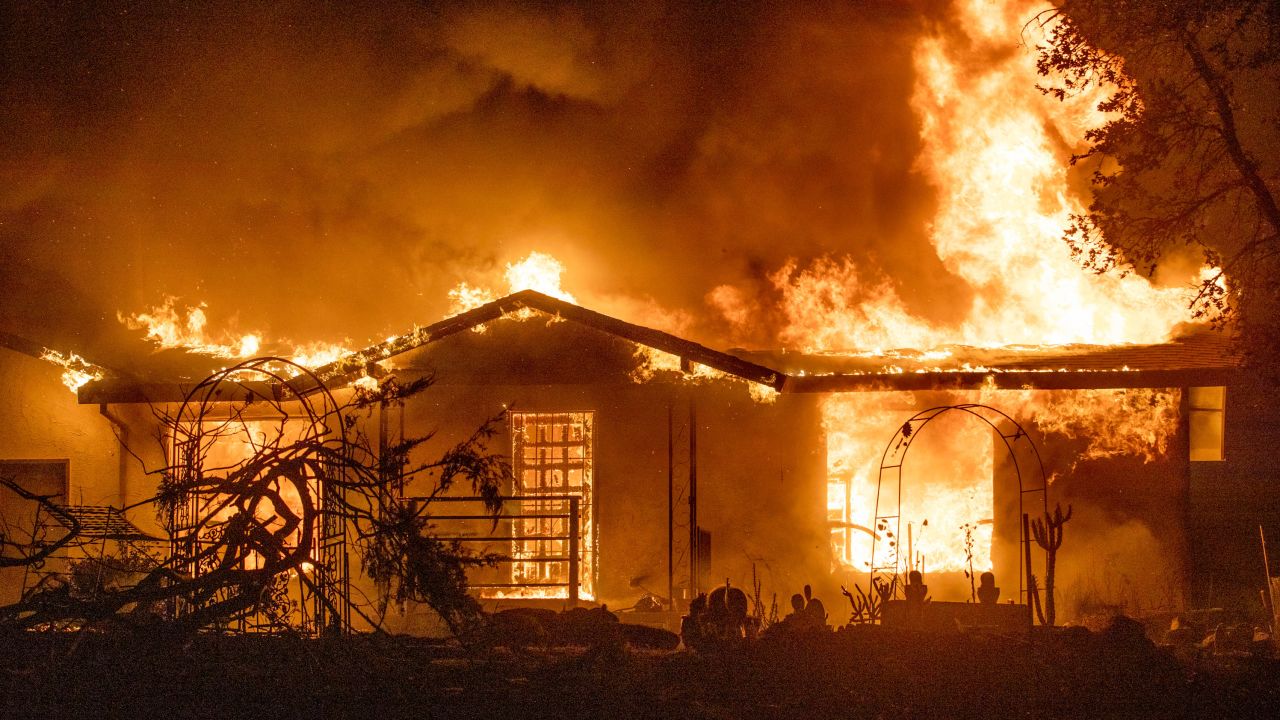 A house burns on Platina Road at the Zogg Fire near Ono, California.