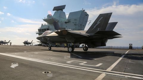 US Marine Fighter Attack Squadron 211 conducts flight deck operations onboard the Royal Navy aircraft carrier HMS Queen Elizabeth in the South China Sea on July 27. 