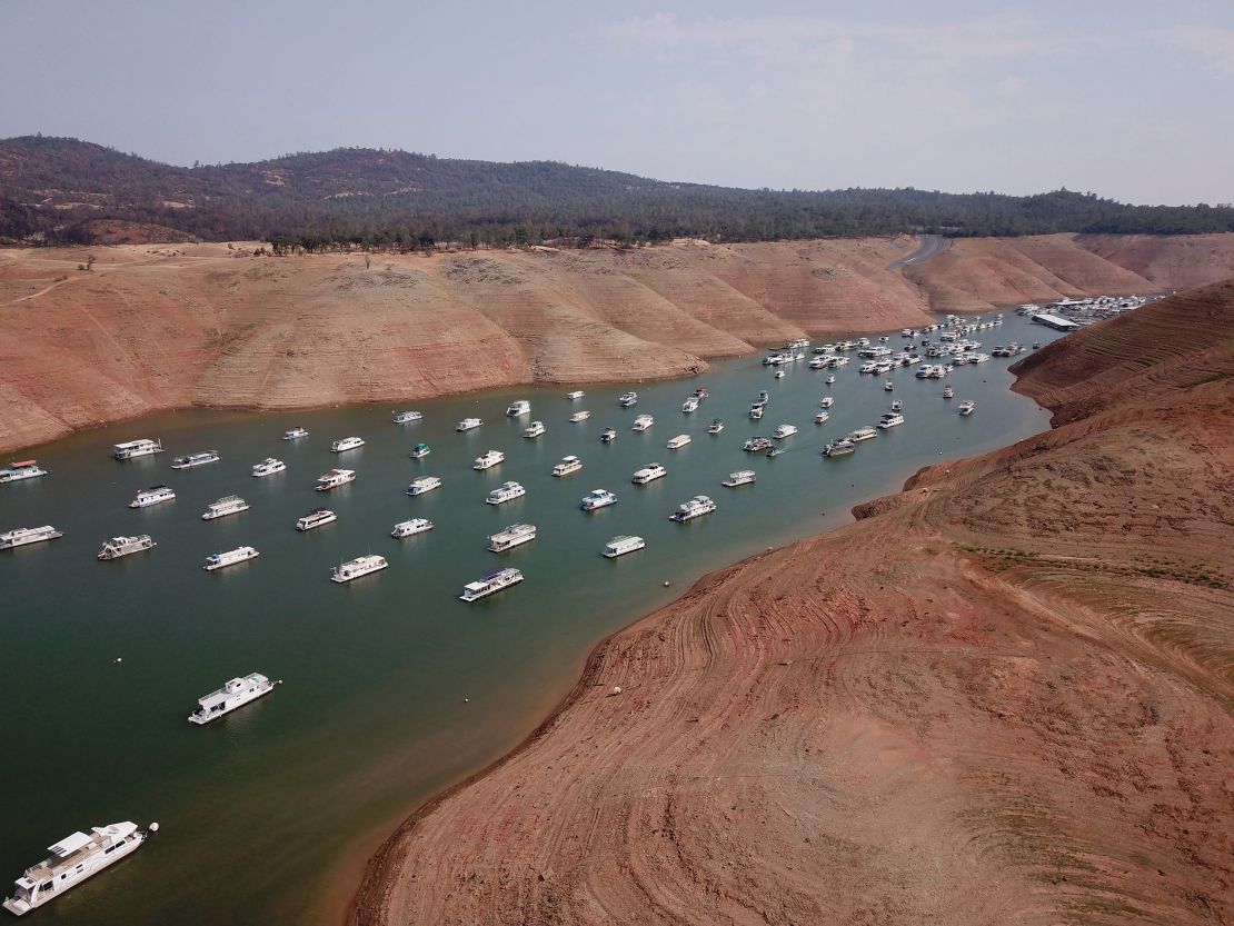 Houseboats sit in low water on Lake Oroville as California's drought emergency worsens