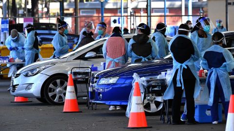 Health workers takes swab samples from residents at a Covid-19 drive-through testing clinic in Sydney on July 28.