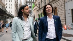 Baiju Bhatt, left, and Vladimir Tenev, Co-Founders of Robinhood, walk on Wall Street following their company's IPO at Nasdaq, Thursday, July 29, 2021 in New York. 