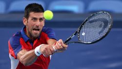 TOKYO, JAPAN - JULY 30: Novak Djokovic of Team Serbia plays a backhand during his Men's Singles Semifinal match against Alexander Zverev of Team Germany on day seven of the Tokyo 2020 Olympic Games at Ariake Tennis Park on July 30, 2021 in Tokyo, Japan. (Photo by Clive Brunskill/Getty Images)