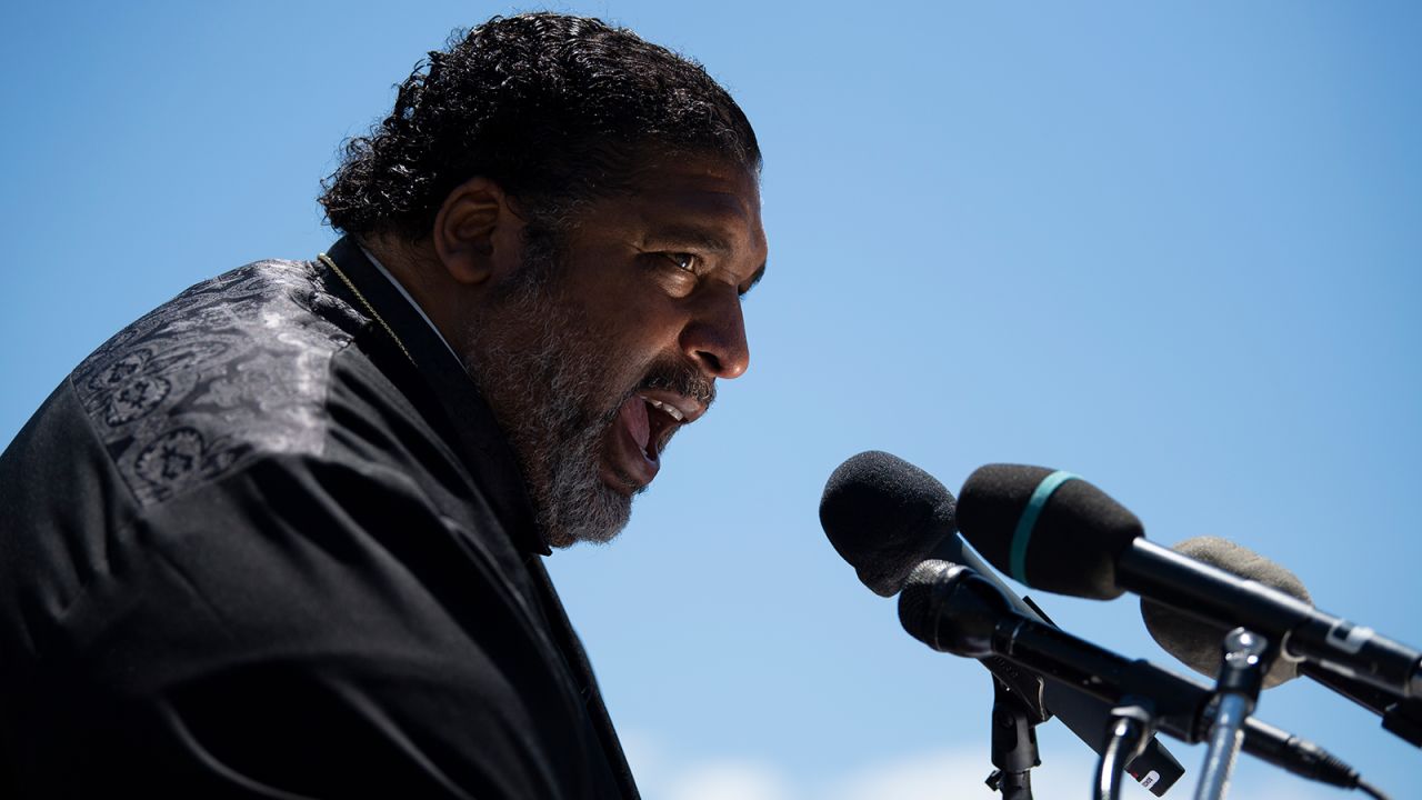 Bishop William J. Barber II speaks at the Moral March on Manchin and McConnell, a rally held by the Poor People's Campaign, calling for the elimination the legislative filibuster and passage of the "For The People" voting rights bill, outside the Supreme Court in Washington, DC, June 23.