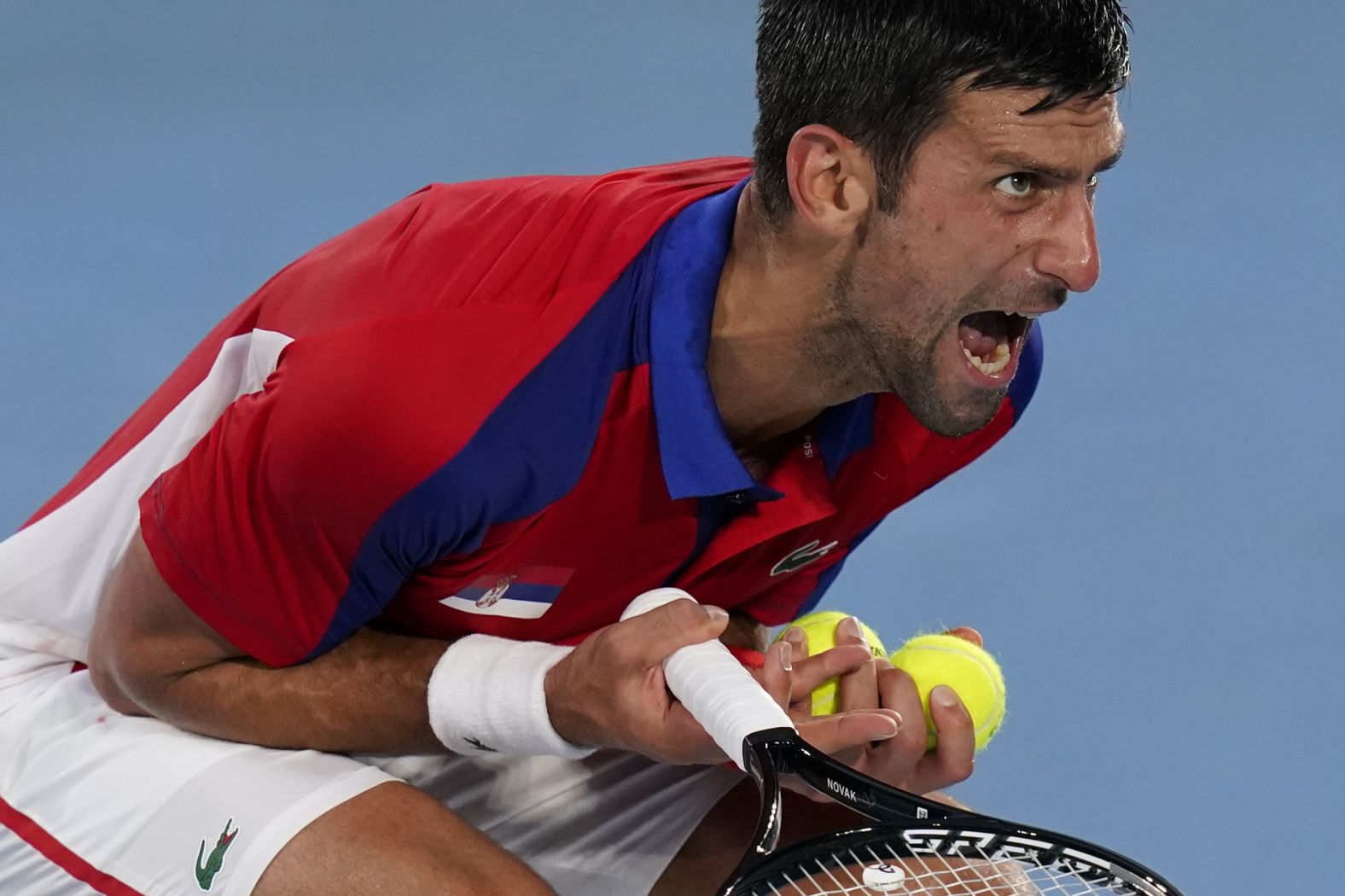 The world's top-ranked tennis player, Serbia's Novak Djokovic, reacts during his semifinal match against Germany's Alexander Zverev on Friday, July 30. Zverev won 1-6, 6-3, 6-1, ending Djokovic's <a href="index.php?page=&url=https%3A%2F%2Fwww.cnn.com%2Fworld%2Flive-news%2Ftokyo-2020-olympics-07-30-21-spt%2Fh_9febcc9aa1b72eb9df5e9c8a6b60d055" target="_blank">quest for a "Golden Slam."</a> Djokovic has already won the Australian Open, the French Open and Wimbledon this year. He was looking to add an Olympic gold and then a US Open title later in the year. The only person in history to win all five in one calendar year was Steffi Graf in 1988. 