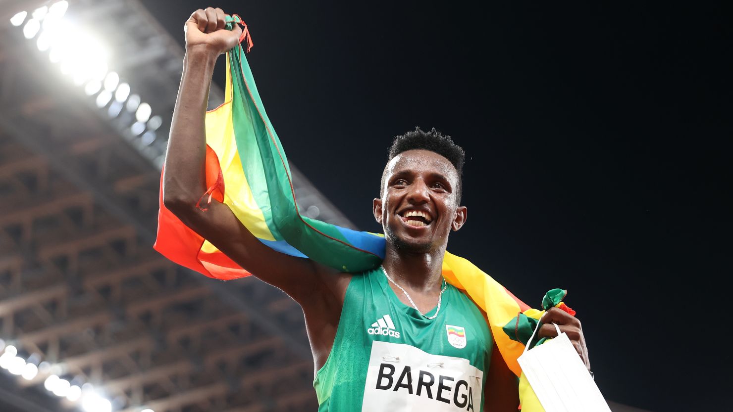 Selemon Barega celebrates 10,000-meter gold at the Tokyo Olympics. 