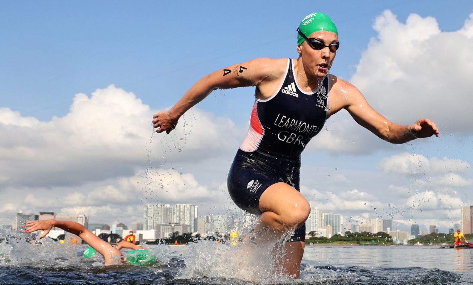 Great Britain's Jessica Learmonth competes in the mixed relay triathlon on July 31. Great Britain won gold in the event, which was the first of its kind in Olympics history.