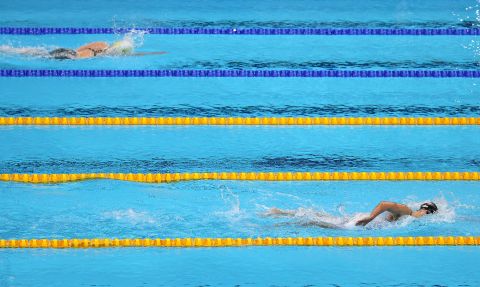 The United States' Katie Ledecky leads Australia's Ariarne Titmus during the 800-meter freestyle on July 31. <a href="https://www.cnn.com/world/live-news/tokyo-2020-olympics-07-30-21-spt/h_54e2fe78b366440913795bbeafb5f449" target="_blank">Ledecky won the event for the third straight Olympics.</a> Titmus took the silver.