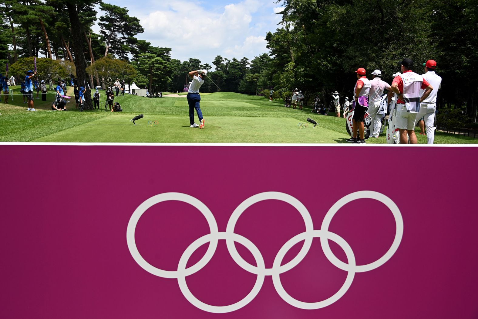 US golfer Xander Schauffele hits a tee shot during the third round on Saturday, July 31. <a href="index.php?page=&url=https%3A%2F%2Fwww.cnn.com%2Fworld%2Flive-news%2Ftokyo-2020-olympics-08-01-21-spt%2Fh_59d1594d965ff40e9283eb85afbefd2c" target="_blank">He went on to win gold,</a> holding off Slovakia's Rory Sabbatini by one stroke.