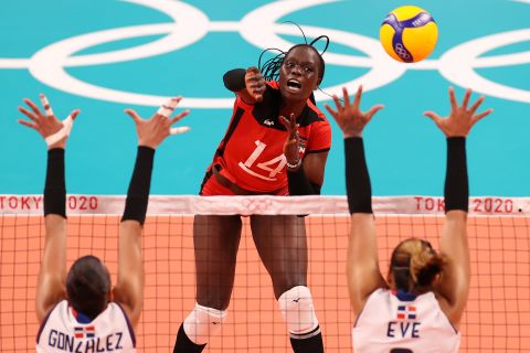 Kenya's Mercy Moim spikes the ball during a volleyball match against the Dominican Republic on July 31.