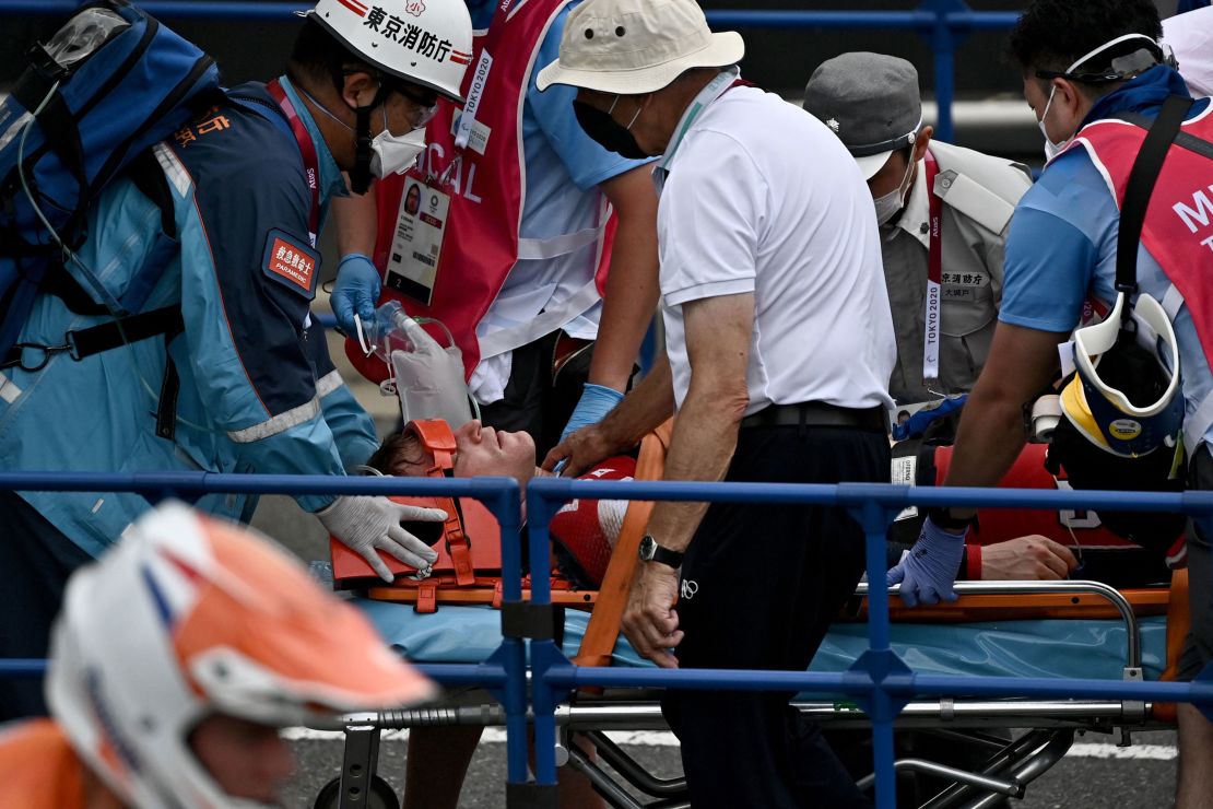 Fields receives medical assistance after crashing in the BMX racing semifinals.