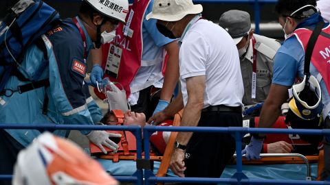 Fields receives medical assistance after crashing in the BMX racing semifinals.