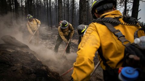 Firefighters from New Mexico work amidst heavy ash and dust to help contain the Bootleg Fire near Silver Lake, Oregon, on July 29, 2021. 