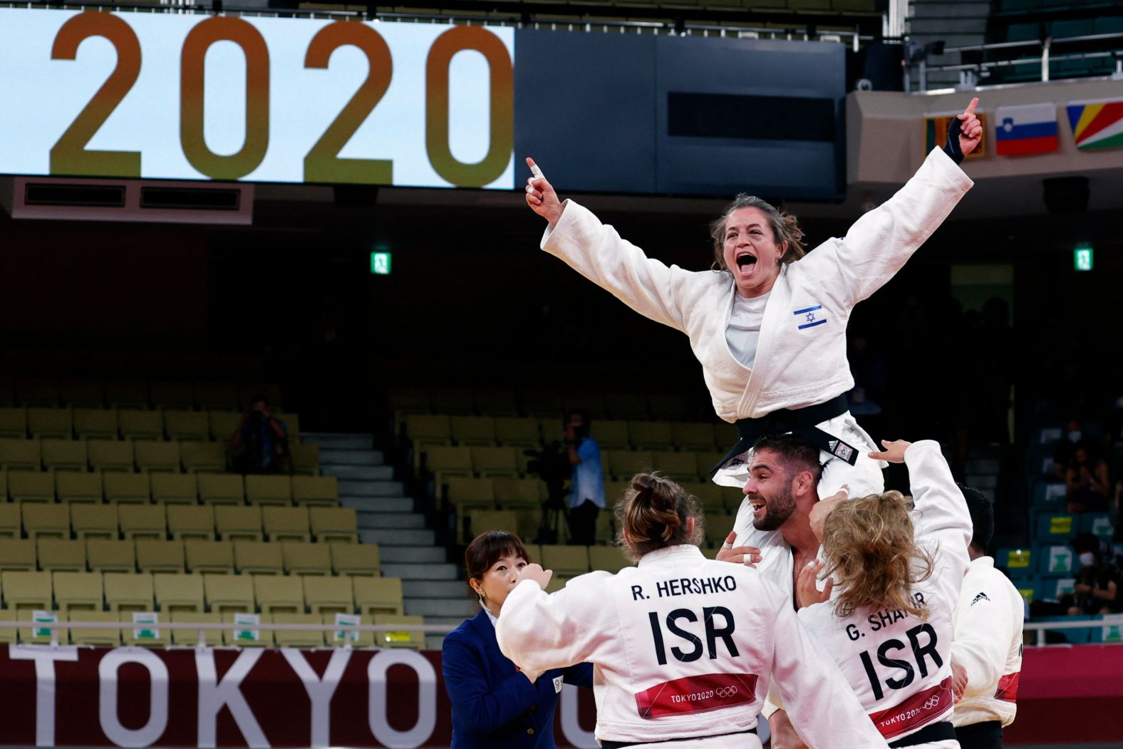 Team Israel celebrates winning the bronze in the judo mixed-team event on July 31. France won the gold and Japan won the silver.