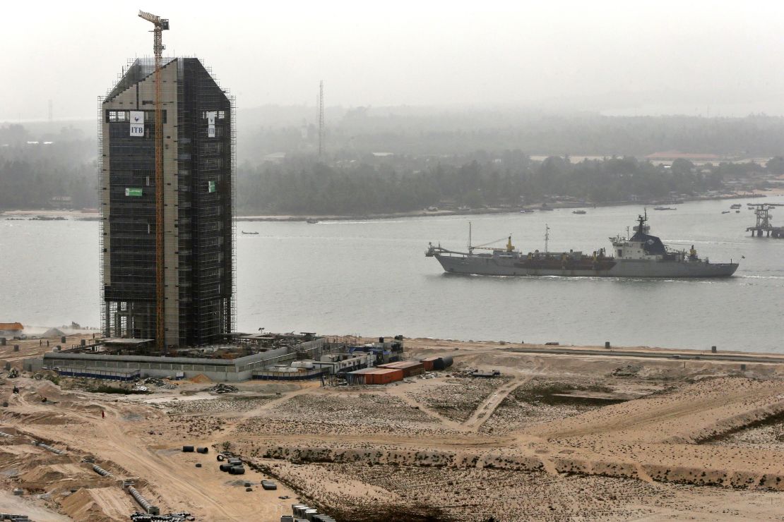 A cargo ship passes along a waterway during construction at the Eko Atlantic city site in February 2016.