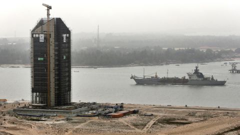 A cargo ship passes along a waterway during construction at the Eko Atlantic city site in February 2016.