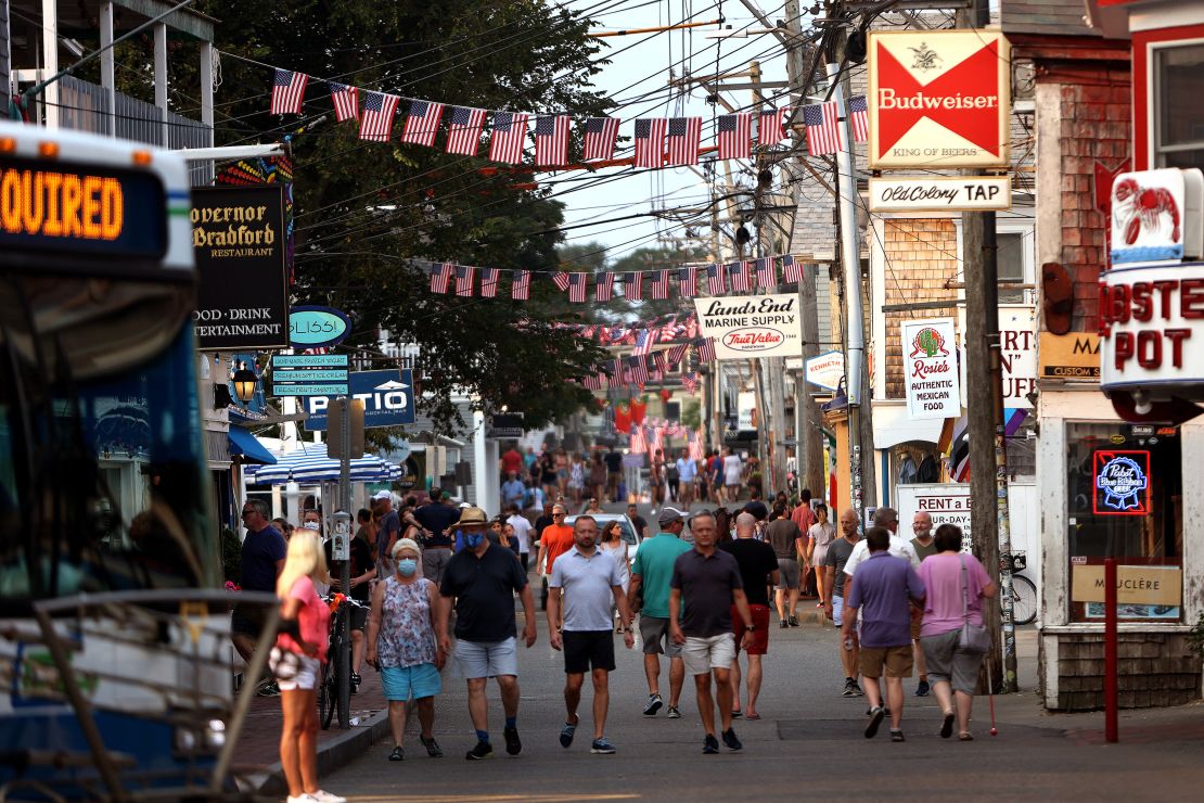 People walk down Commercial Street in Provincetown on Tuesday, July 20.