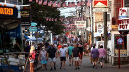 Foot traffic along Commercial street in Provincetown, MA on July 20, 2021.  Provincetown officials have issued a new mask-wearing advisory for indoors regardless of vaccination status on the latest news data showing that Provincetown COVID cases are increasing.