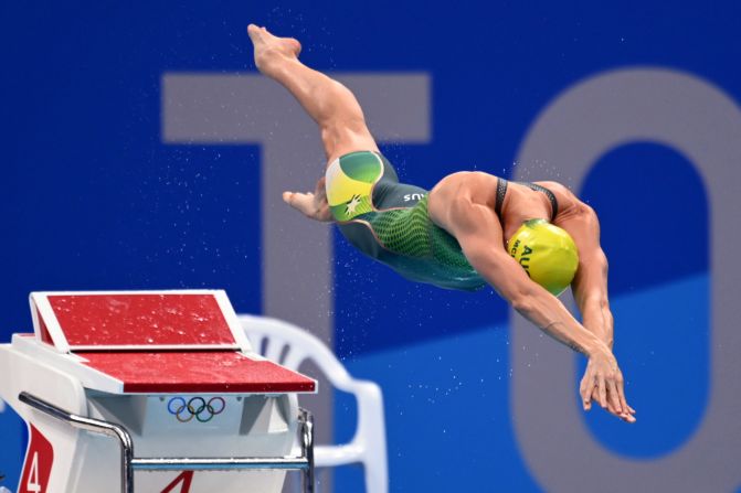 Australian swimmer Emma McKeon dives into the pool at the start of the 50-meter freestyle final on August 1. <a href="https://www.cnn.com/world/live-news/tokyo-2020-olympics-07-31-21-spt/h_a446974be9f9f42dd484d438fdc1f426" target="_blank">She won her third gold in Tokyo</a> and set an Olympic record time of 23.81 seconds.