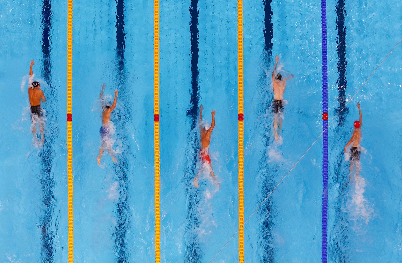 From left, Italy's Gregorio Paltrinieri, the United States' Bobby Finke, Ukraine's Mykhailo Romanchuk, Germany's Florian Wellbrock and Great Britain's Daniel Jervis race the 1,500-meter freestyle on August 1. <a href="index.php?page=&url=https%3A%2F%2Fwww.cnn.com%2Fworld%2Flive-news%2Ftokyo-2020-olympics-07-31-21-spt%2Fh_fd9cb74d1f4403d6a096f915c2eeb0dd" target="_blank">Finke won the gold</a> after racing down Romanchuk and Wellbrock in the final 50 meters. Finke also won gold in the 800-meter freestyle earlier in these Olympics.