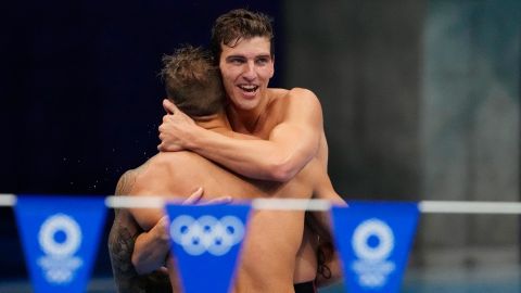 Caeleb Dressel and Zach Apple celebrate their victory in the men's 4x100m medley final on Sunday