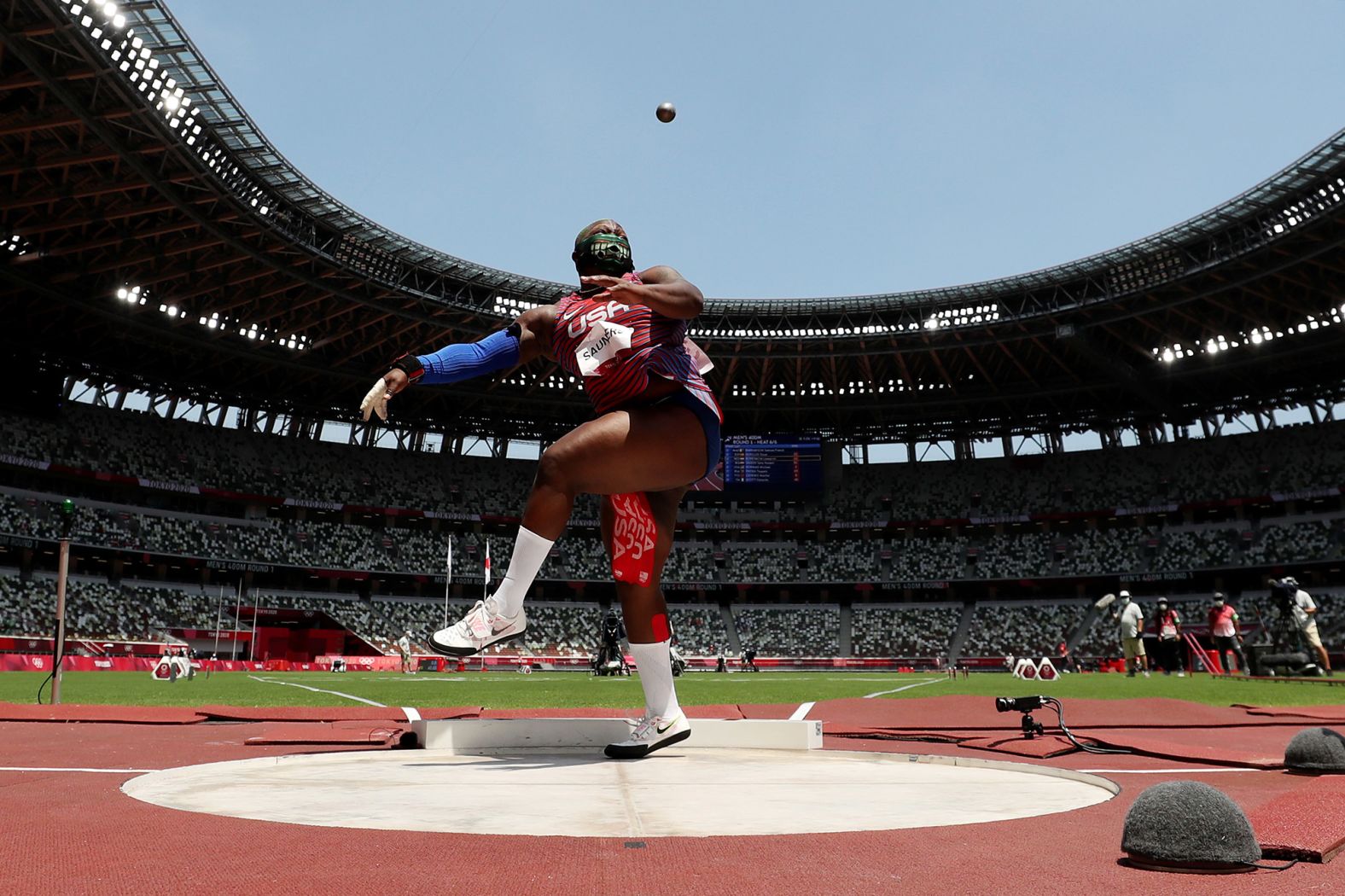 The United States' Raven Saunders competes in the shot put on August 1. Saunders, <a href="index.php?page=&url=https%3A%2F%2Fwww.cnn.com%2Fworld%2Flive-news%2Ftokyo-2020-olympics-08-01-21-spt%2Fh_49dcfff65c83baeeee7adb5ad0c3dc67" target="_blank">who stood out with her eye-catching mask and her green and purple hair,</a> won the silver.