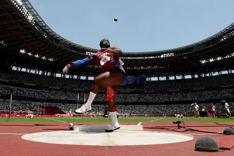 The United States' Raven Saunders competes in the shot put on August 1. Saunders, <a href="https://www.cnn.com/world/live-news/tokyo-2020-olympics-08-01-21-spt/h_49dcfff65c83baeeee7adb5ad0c3dc67" target="_blank">who stood out with her eye-catching mask and her green and purple hair,</a> won the silver.
