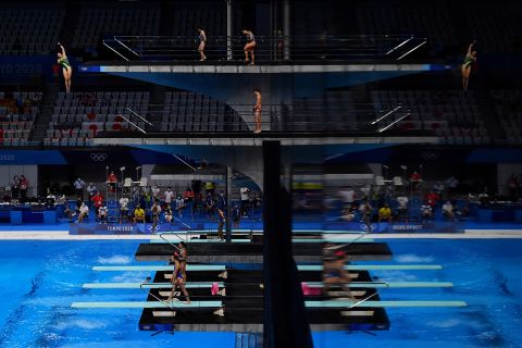 Divers warm up ahead of the women's 3-meter springboard finals on August 1.