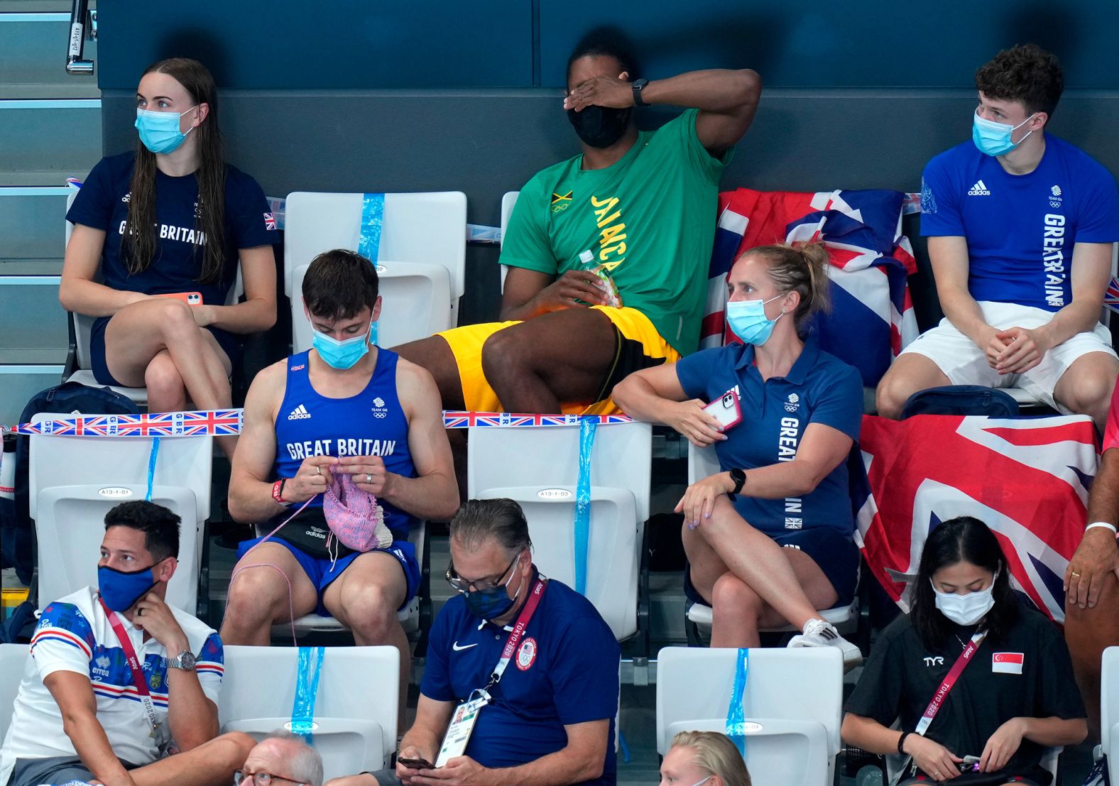 British diver Tom Daley, who has a whole <a href="https://www.instagram.com/madewithlovebytomdaley/" target="_blank" target="_blank">Instagram account</a> devoted to his hobby of knitting and crochet, works on a new creation while watching the women's 3-meter springboard final on August 1. On his Instagram Stories, he revealed he was making a "jumper," or sweater, for a French bulldog. Daley <a href="https://www.cnn.com/2021/07/26/sport/tom-daley-matty-lee-diving-olympic-gold-spt-intl/index.html" target="_blank">picked up the hobby</a> during the pandemic.