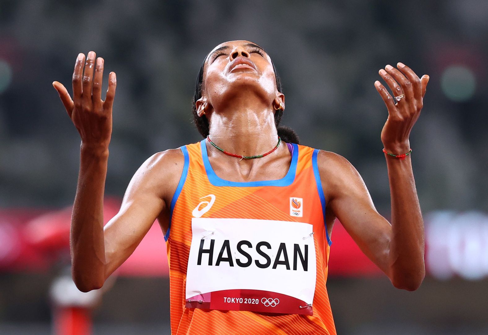 Dutch runner Sifan Hassan celebrates after winning <a href="index.php?page=&url=https%3A%2F%2Fwww.cnn.com%2Fworld%2Flive-news%2Ftokyo-2020-olympics-08-01-21-spt%2Fh_7420134ef52384301a9248b1d162bb5f" target="_blank">her 1,500-meter heat</a> on August 2. Hassan won despite falling down at the beginning of the last lap. She tripped over another runner but got up and raced past the field.