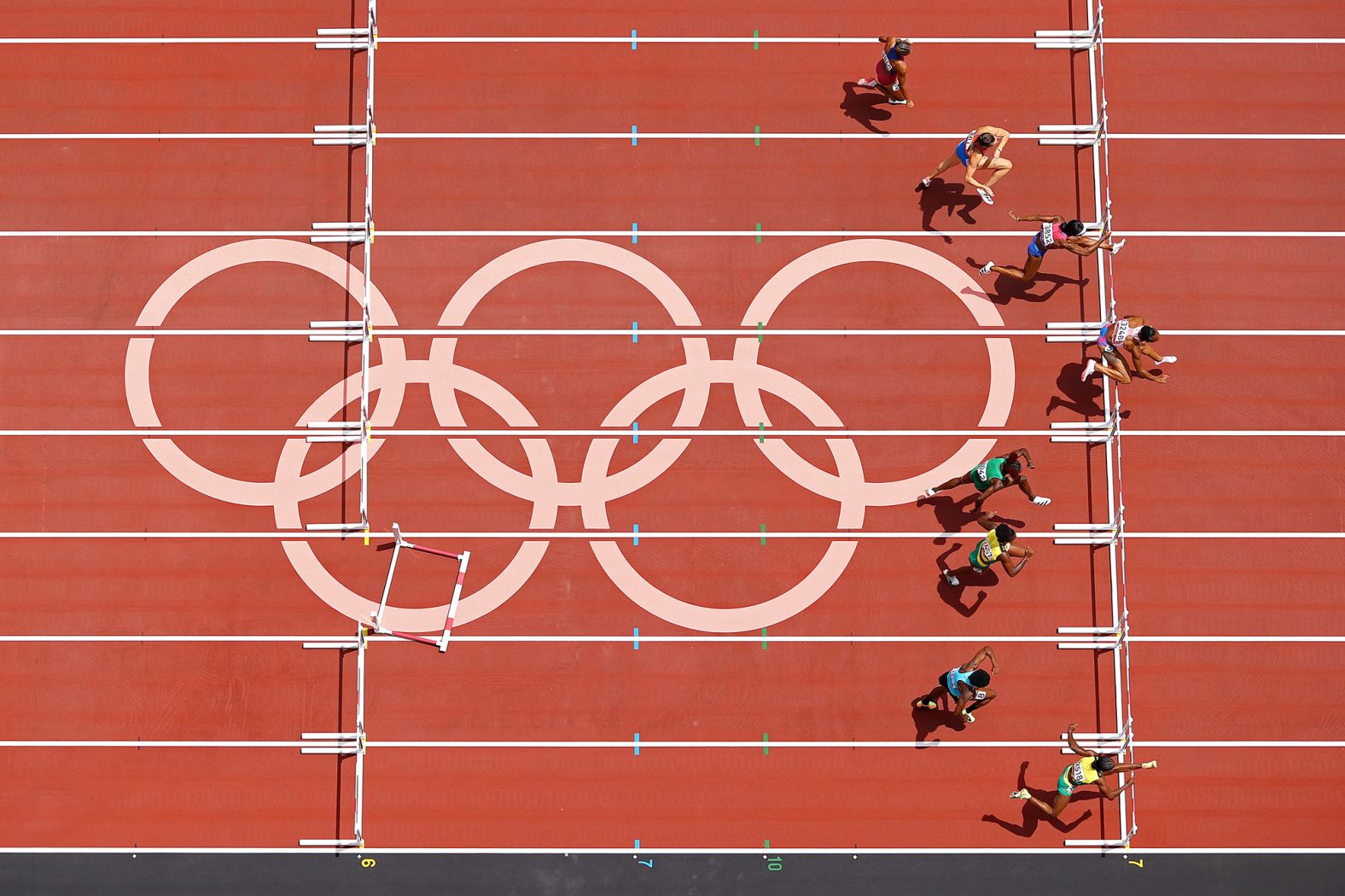 Puerto Rico's Jasmine Camacho-Quinn leads the field on her way to a gold medal in the 100-meter hurdles on August 2. It was Puerto Rico's second-ever gold medal and its first in track.