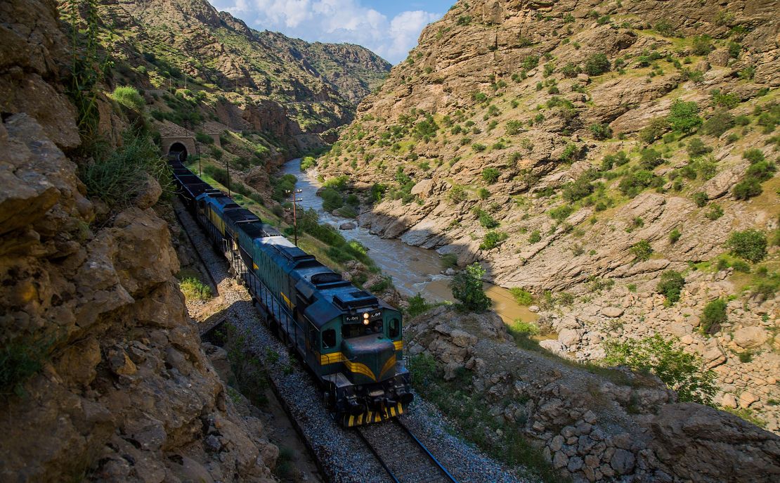 A freight train passes through Lorestan on the Trans-Iranian Railways' Bisheh-Dorud route.  