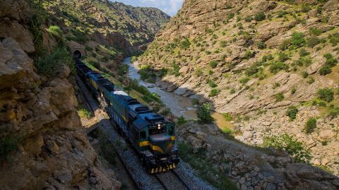 A freight train passes through Lorestan on the Trans-Iranian Railways' Bisheh-Dorud route.  