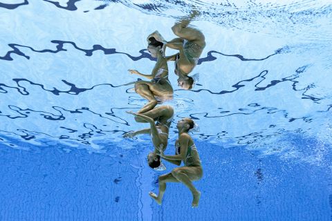This photo, taken underwater, shows Greece's Evangelia Papazoglou and Evangelia Platanioti competing in artistic swimming on August 2. Artistic swimming used to be called synchronized swimming at the Olympics.