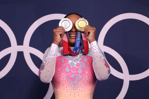 Brazilian gymnast Rebeca Andrade poses with her medals on August 2. During these Games, she won gold in the vault and silver in the individual all-around.