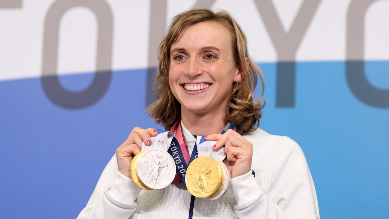 Ledecky poses with her two gold and two silver medals at the Tokyo Olympics.